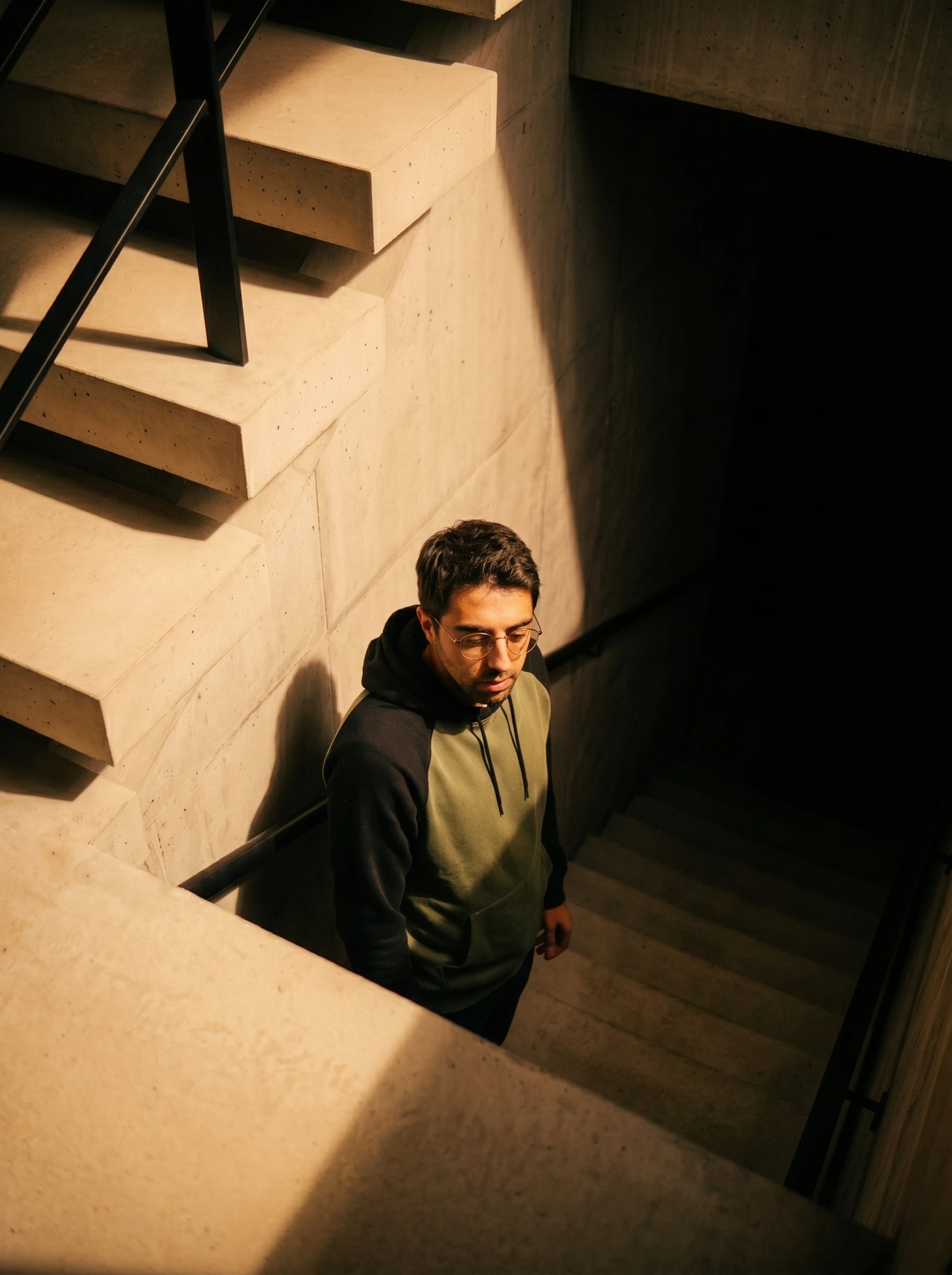 João Telo Gonçalves standing on a concrete staircase